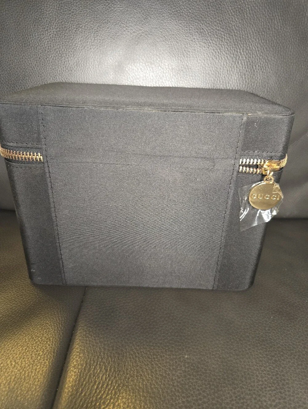 Gucci Black and Gold Travel Case